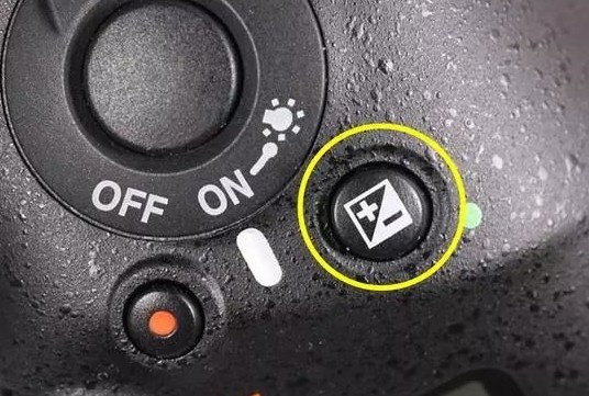 露出補正のボタン