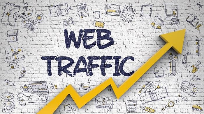 Bild einer Wand mit skizzierten Gegenständen und dem Wort Web Traffic im Graffitistil